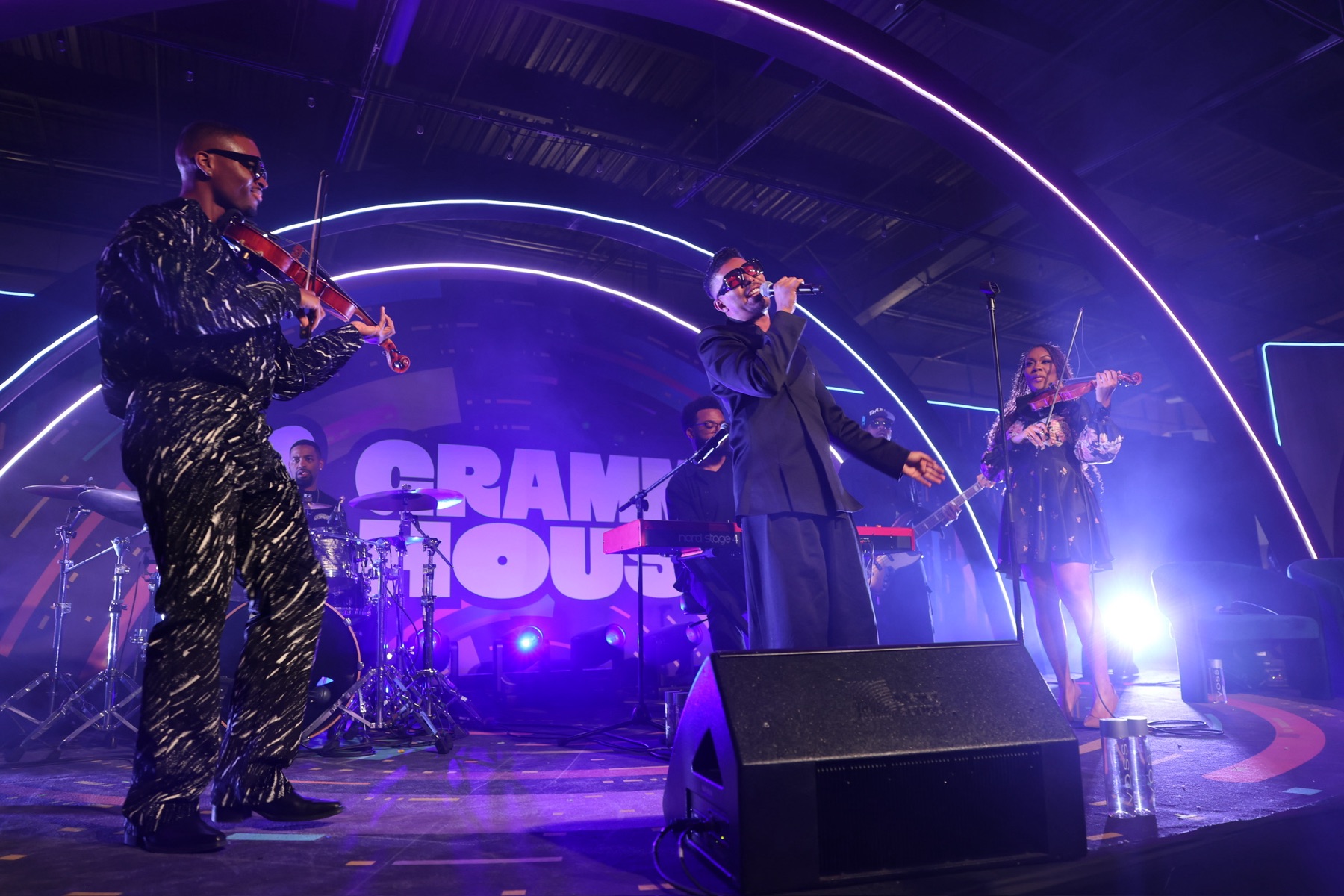 Stevie Mackey performing with the band on the GRAMMY House stage